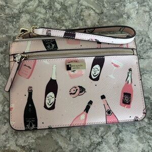 Kate Spade Shore Street Tinie Champagne and Caviar Print Wristlet 5" x 7"